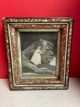 1906 embossed framed print of girl and huge lion