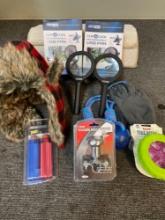 small rugs, dog toys, winter hat, misc hardware