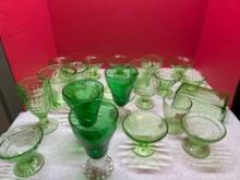 large quantity of green depression glass