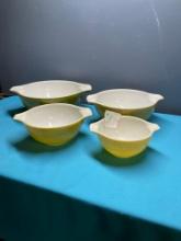 Green and yellow Pyrex Cinderella bowls