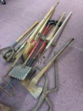 variety of sledgehammer rake, ax, yard tools