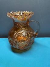 Dugan Carnival glass pitcher