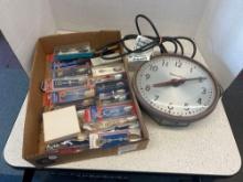 vintage collectible, spoons and knife, and old simplex clock