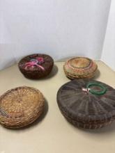 Four vintage woven baskets