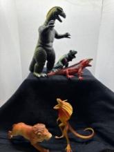 Godzilla action figure lion and reptile action figures