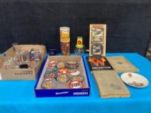 Shot glasses, patches, new old stock ashtrays, books and more