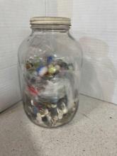 Large glass jar, full of marbles and buttons