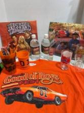 Dukes of Hazard wall calendars, Cooters garage cups and unopened waters. 3 Confederate flags,
