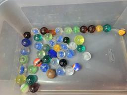 Group of antique marbles, shooters, clays, cat eyes, akro agate
