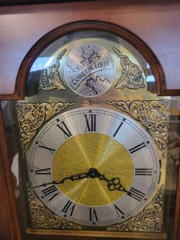 Howard Miller Tempus Fugit grandmother's clock with weights and pendulum