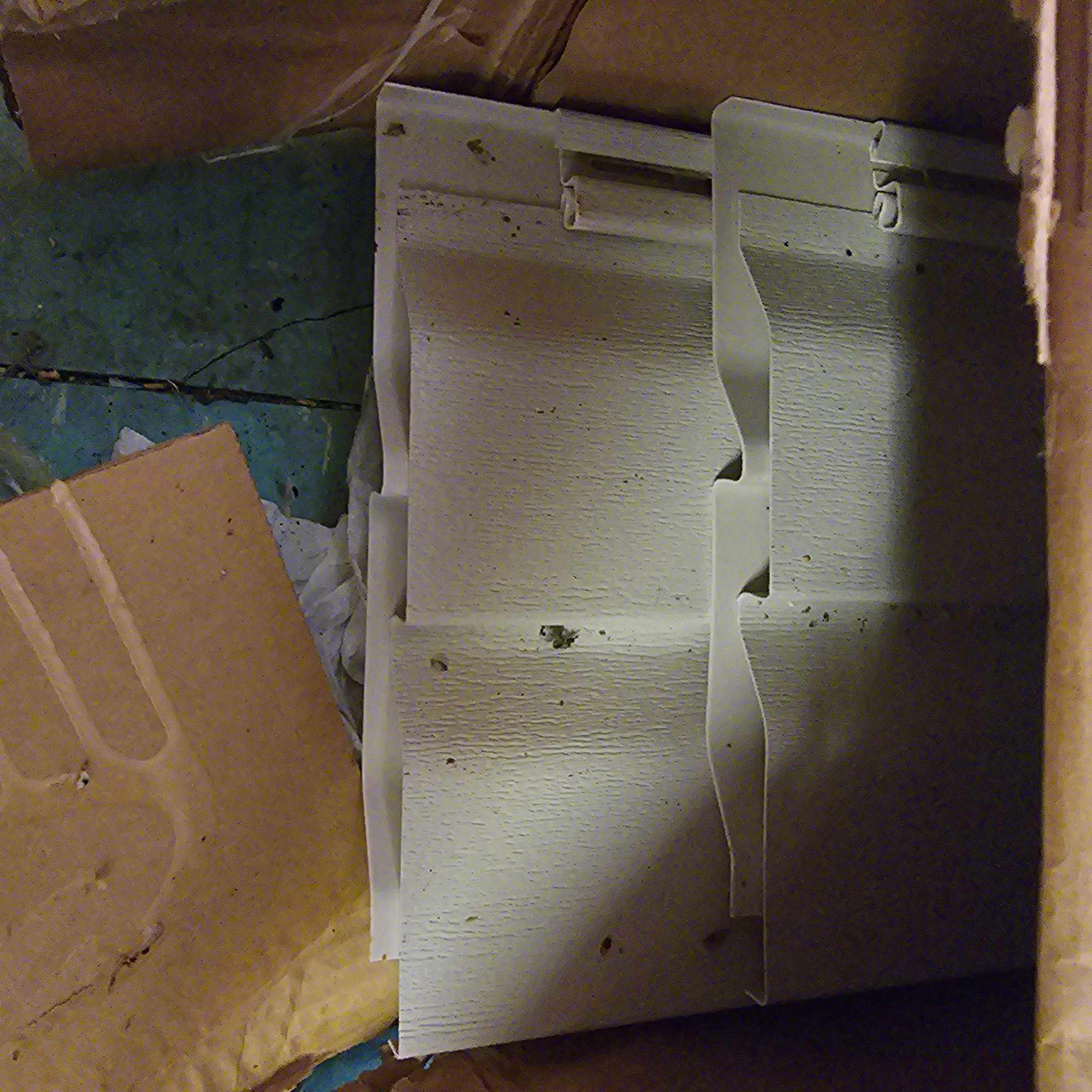 rolls of insulation - BiFold doors - Vinyl siding - peg board - scaffolding cross members