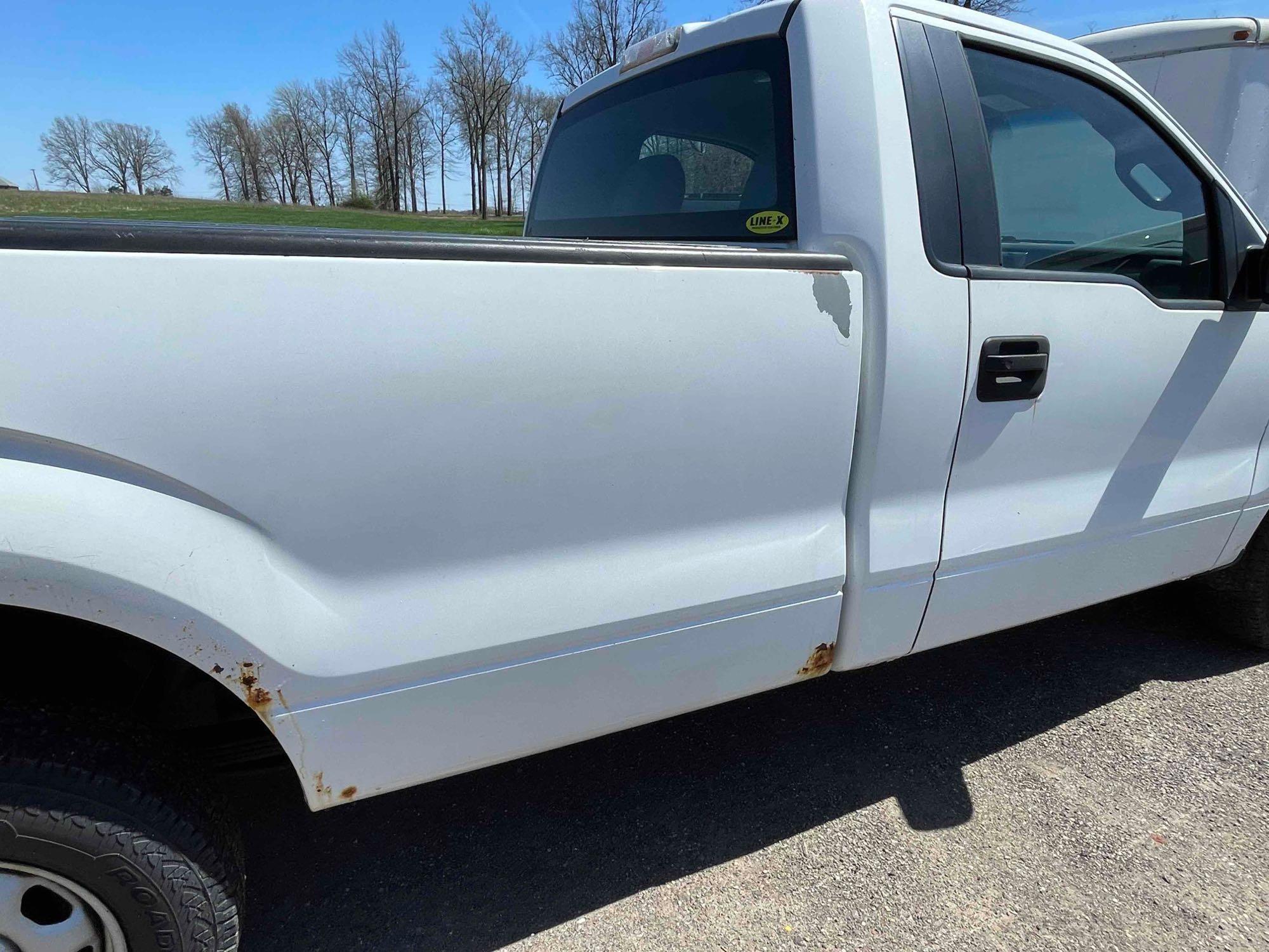 2012 Ford F-150 with 126,546 mi.