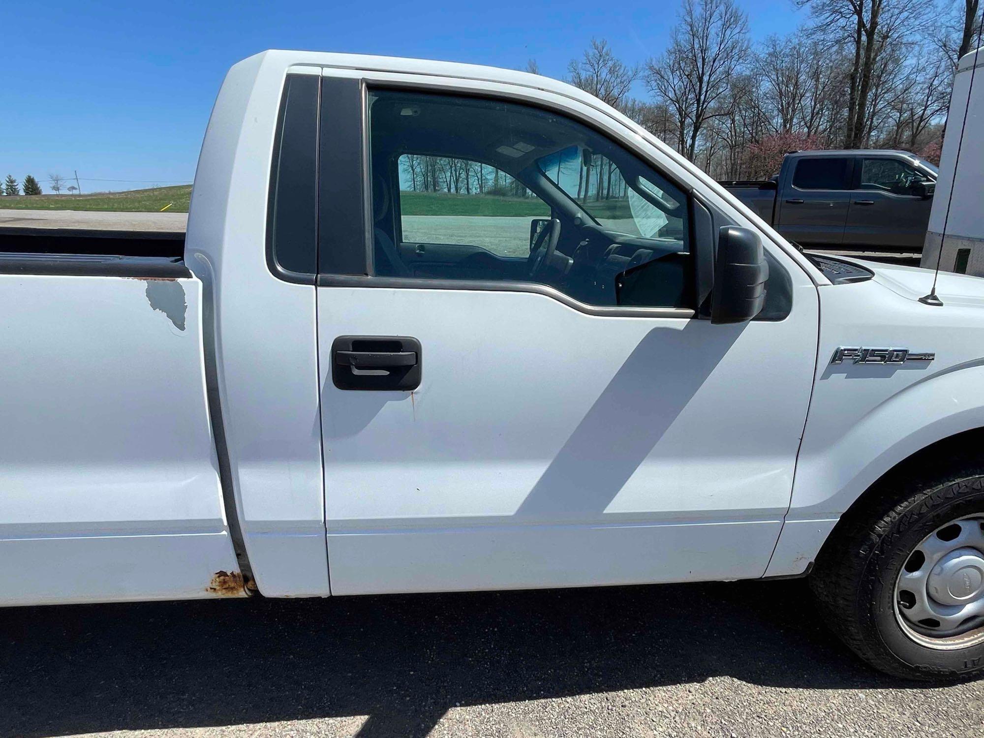 2012 Ford F-150 with 126,546 mi.