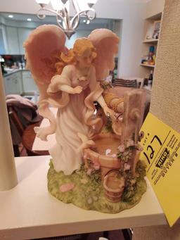 Contents of Shelf - Candles, Angel Figurines, & Candlesticks
