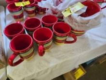 Red pottery bowls and mugs