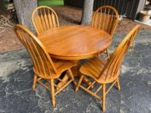 Round Oak Dining Room Table and (4) Chairs and Folding Leaf