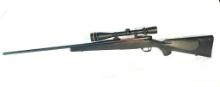 Weatherby Mark V 7MM WBY Caliber Bolt Action Rifle With 6.5X20 Leupold Scope