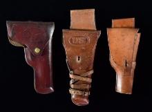 THREE BROWN LEATHER 1911 HOLSTERS.