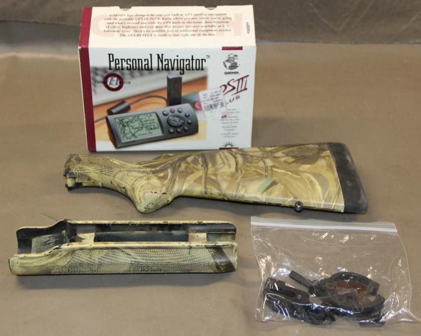 Remington 870 12 Gauge Stock, Personal GPS Navigator, and Whisker Biscuit