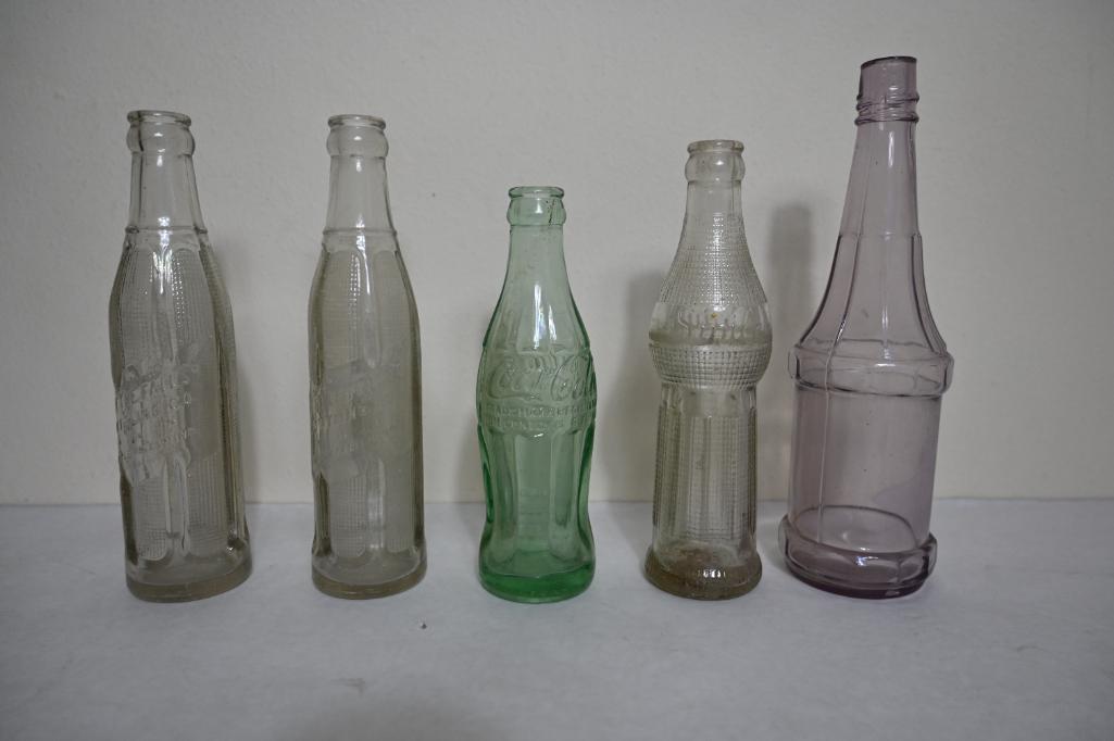 Five antique Bottles