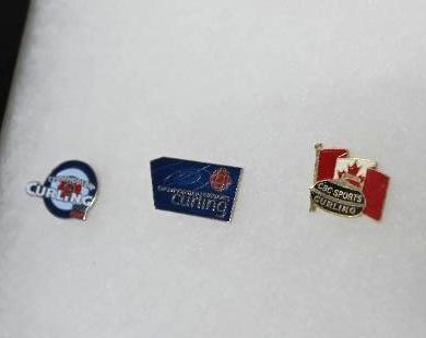 Twelve Hockey & Curling Collector Pins