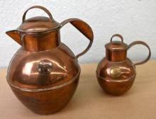 Two Guernsey Copper Pitchers
