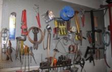 Contents of Peg Board Includes Pipe Wrenches, Hammers, Screwdrivers, and More