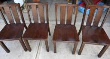 Four Dark Wood Chairs