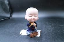 Asian Bobblehead Figurine