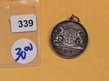 Cool, old, 1900 Silver Medallet