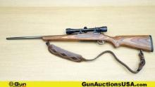 RUGER M77 .284 Win Rifle. Very Good. 22" Barrel. Shiny Bore, Tight Action Bolt Action Features Lamin