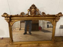 Large gold painted ornate antique mirror