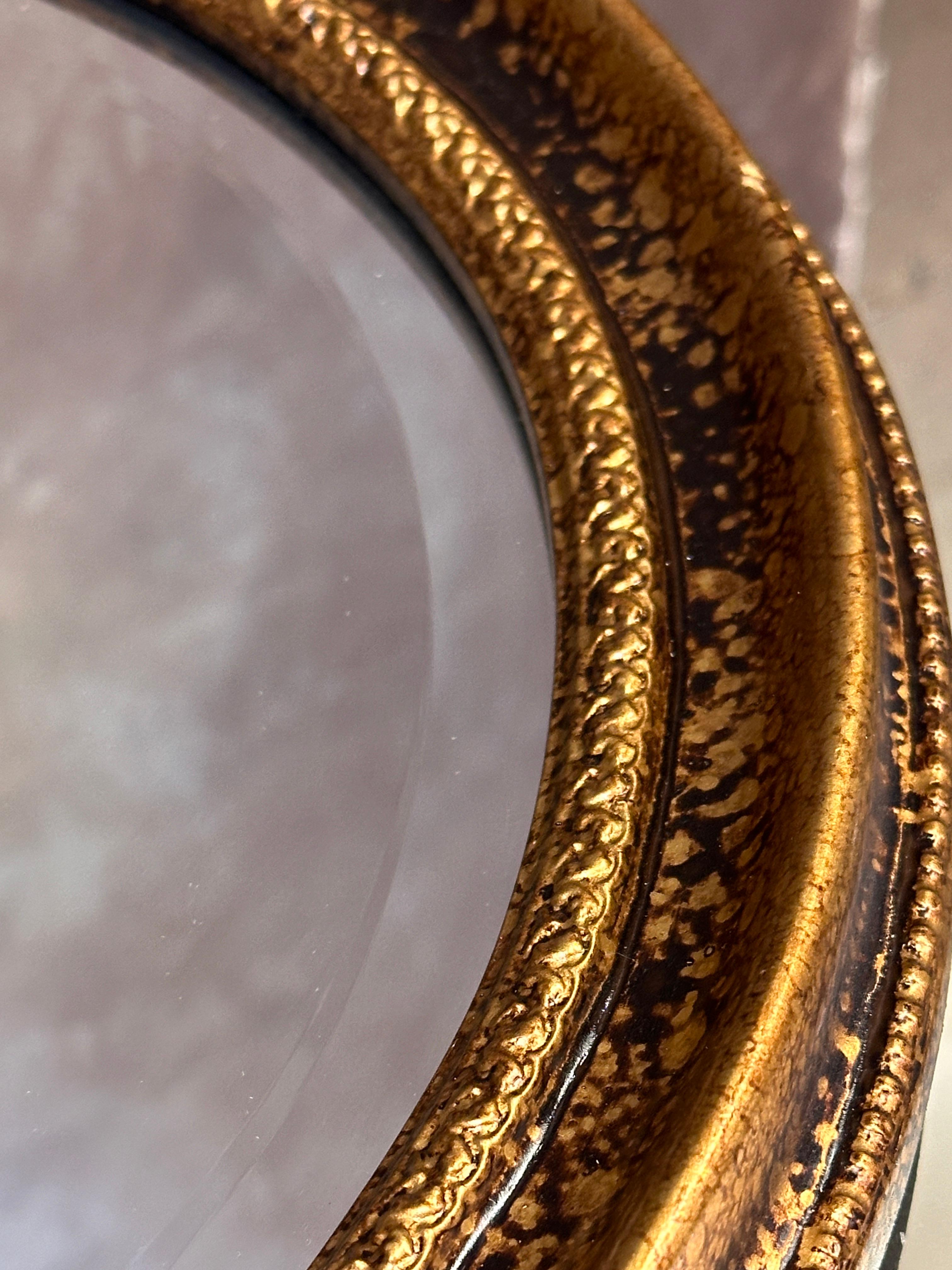 Ornate Gold Toned Framed Arch Mirror