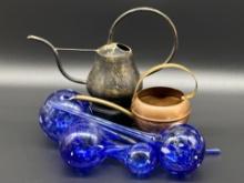 Watering Cans and Blue Glass Watering Bulbs