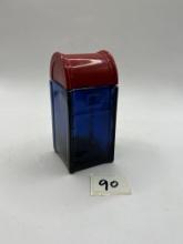 blue and red mail box avon bottle