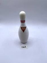bowling pin with some liquid avon bottle