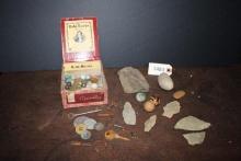Cigar box, marbles, arrowheads, skeleton keys