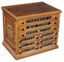 Spool Cabinet, Chadwick's Six Cord, oak 9-drawer w/reverse-painted glass drw