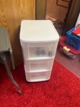 3- 3 drawer plastic container in basement