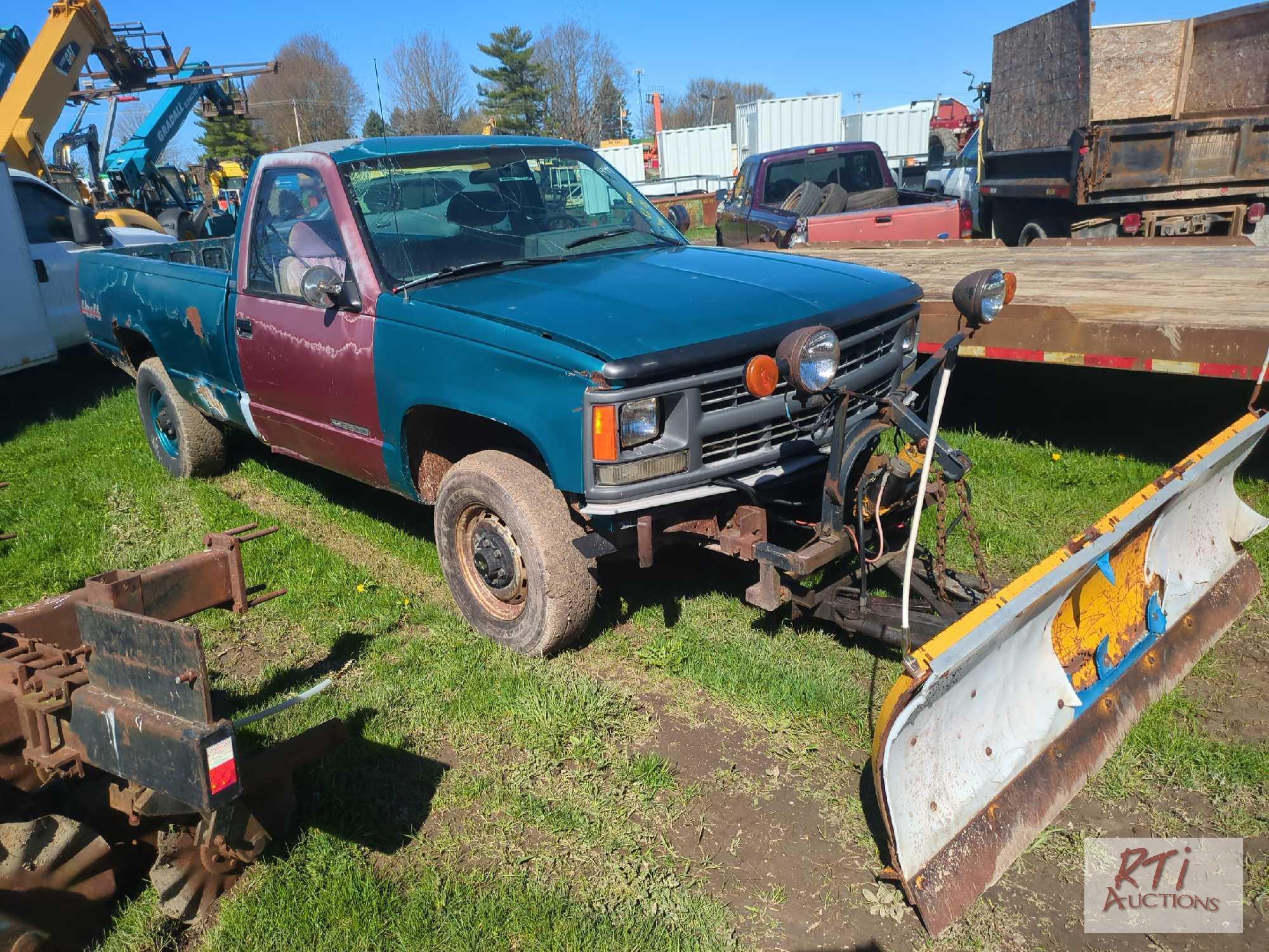 1994 Chevy 1500 regular cab pickup, 4WD, plow, A/C, 209,991 miles, runs very poorly,
