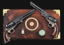 (A) OUTSTANDING PAIR OF FACTORY ENGRAVED COLT 1851 NAVY REVOLVERS COMMISSIONED AND PURCHASED BY VICT