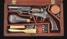 (A) ENGRAVED COLT MODEL 1849 POCKET PERCUSSION REVOLVER IN COLT PARTITIONED CASE.