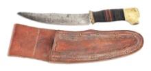 RARE LARGE BILL SCAGEL MADE BOWIE STYLE KNIFE WITH LEATHER SCABBARD.