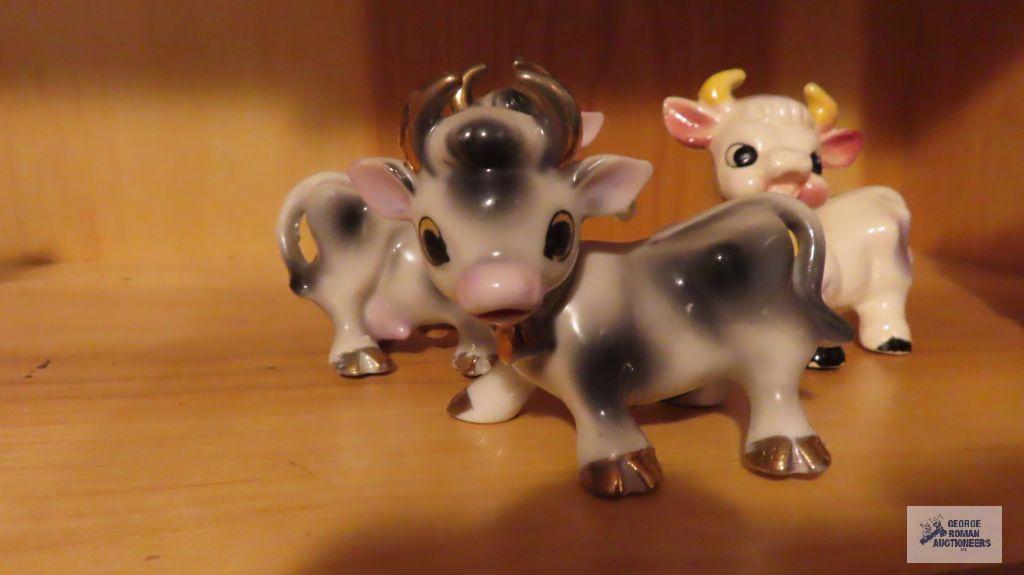 Cow planter and two cow pitchers, all unmarked