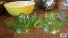 Two green depression...glass...juicers
