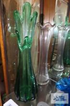 Swung vase and other vases