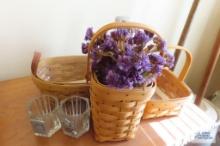 Three Longaberger baskets and two candle holders