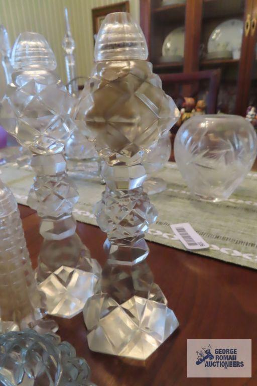 Glass salt and pepper shakers, votive candle holders, and salts