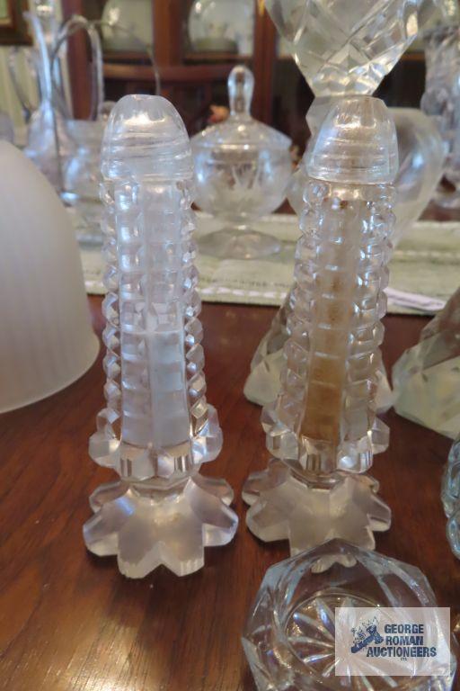 Glass salt and pepper shakers, votive candle holders, and salts