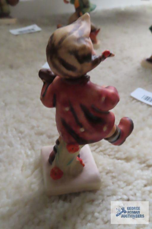 Two Hummel figurines, Home from Market number 198 2/0 and Happiness number 86
